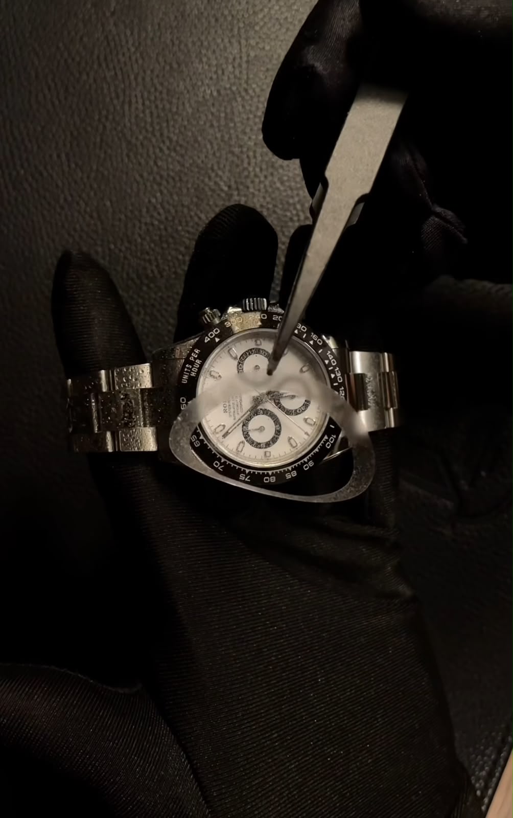 Protection film applied to a chronograph dial